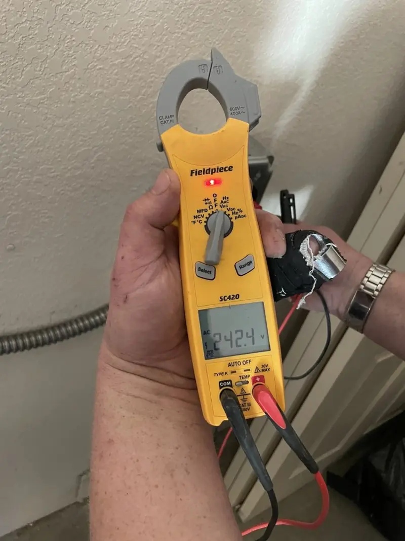 Voltage testing with clamp meter during Generator Installation in Palatine